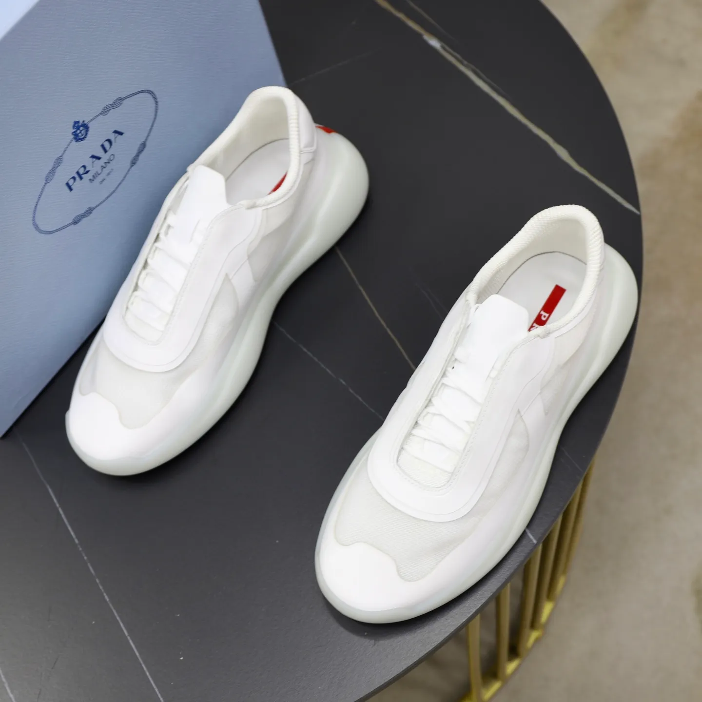 Men's Shoes 💰760💰 PRADA America's Cup Recycled Nylon and Bike Fabric Sneakers Practical and innovative, these regenerated nylon sneakers are modern, with lightweight soles and minimalist details. The upper is decorated with temperature-locking adhesive tape, screen-printed ADA logo, nylon loop shoelaces, T sole, made of ultra-light foam rubber filling material, rubber pattern texture, sole height: 40 mm, removable fabric-covered insole, Size 39-44